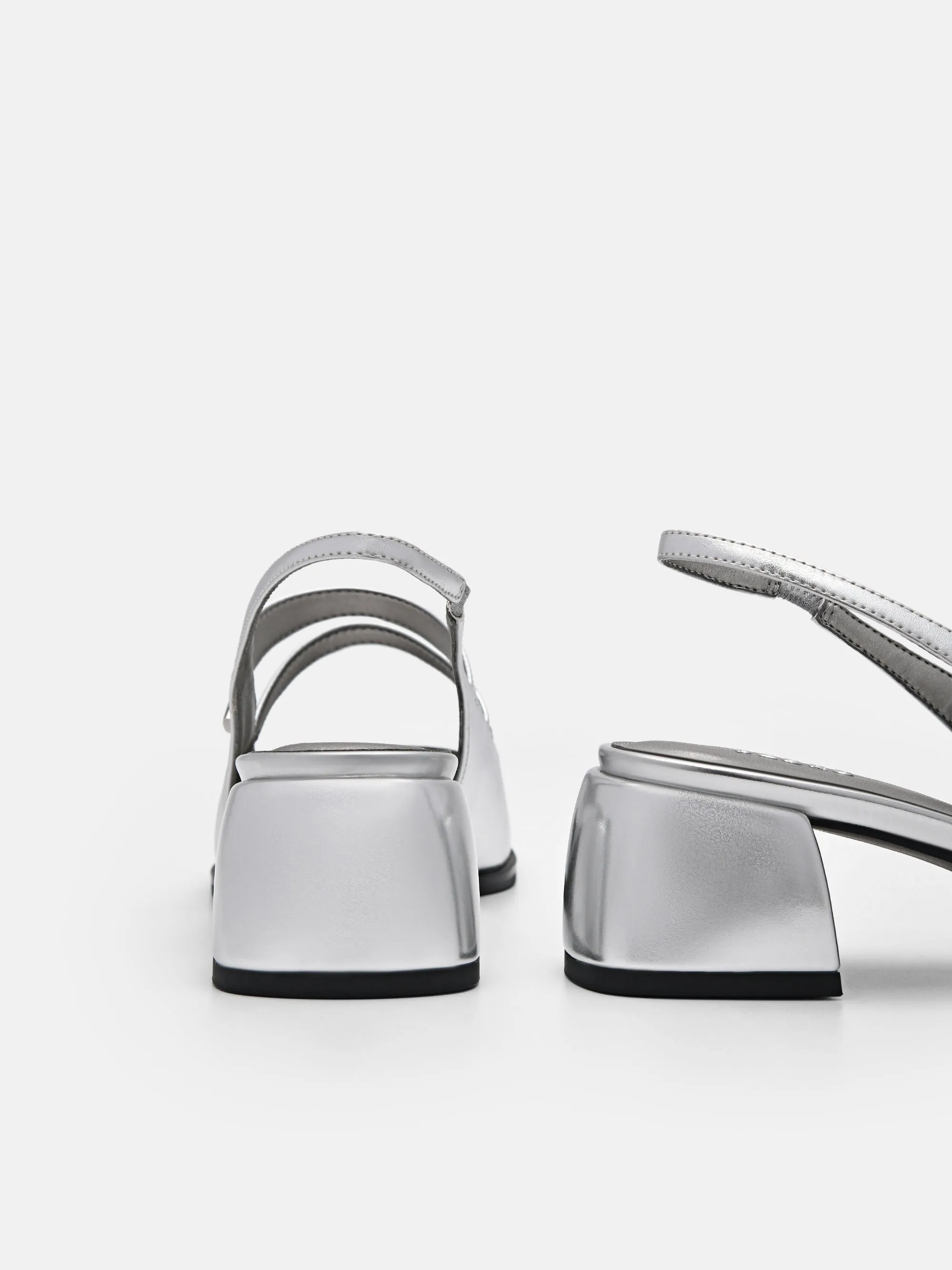 Tria Heel Pumps