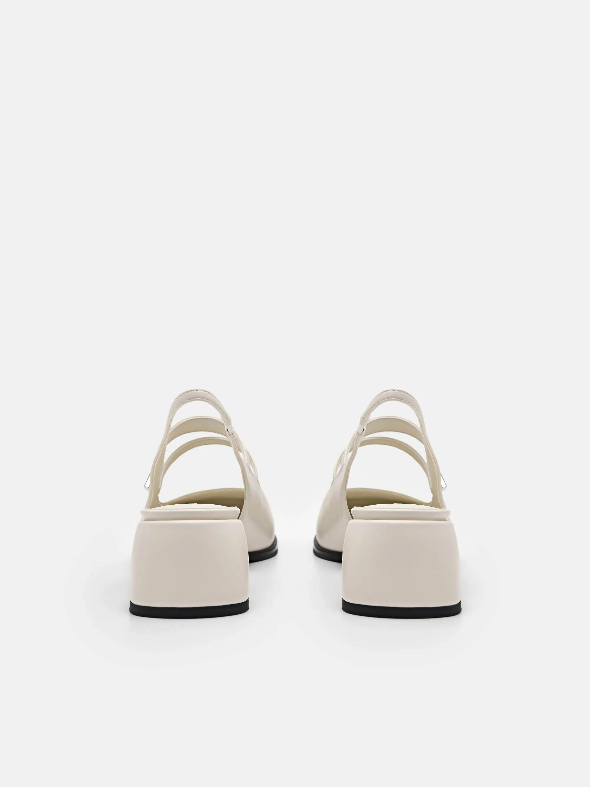 Tria Heel Pumps